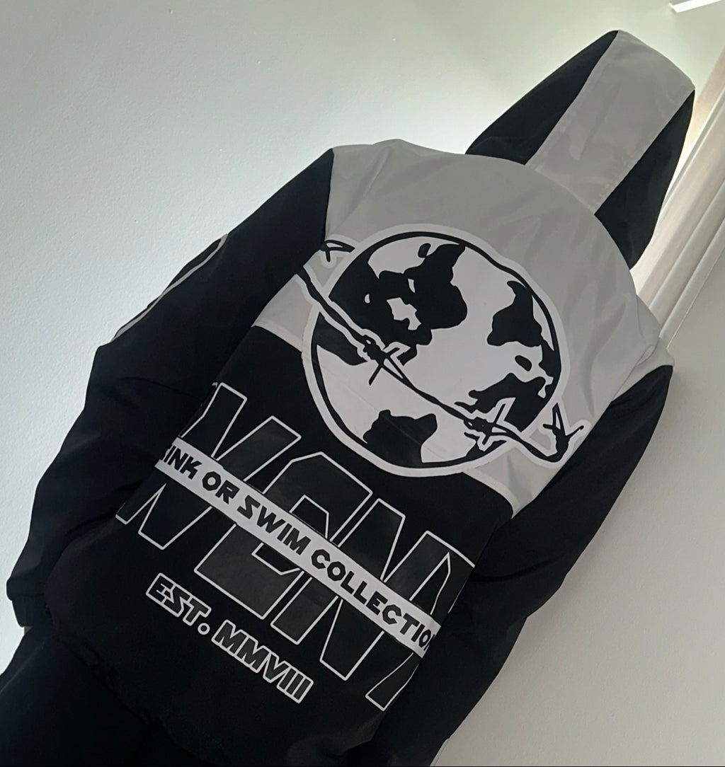 WCNY Windbreaker — Black & White colorway, back view angled