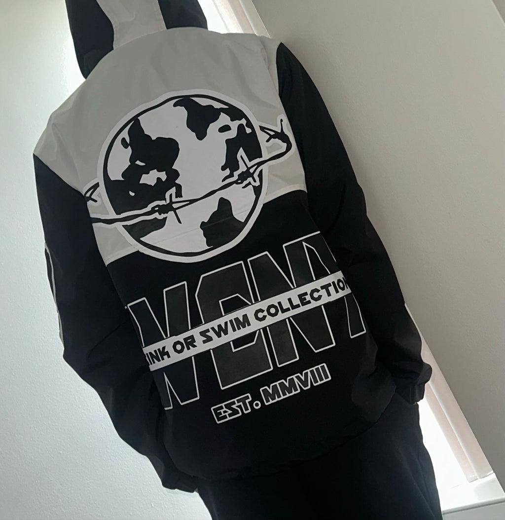 WCNY Windbreaker — Black & White colorway, back view angled