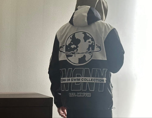 WCNY Windbreaker — Black & White colorway, back view with WCNY globe graphic